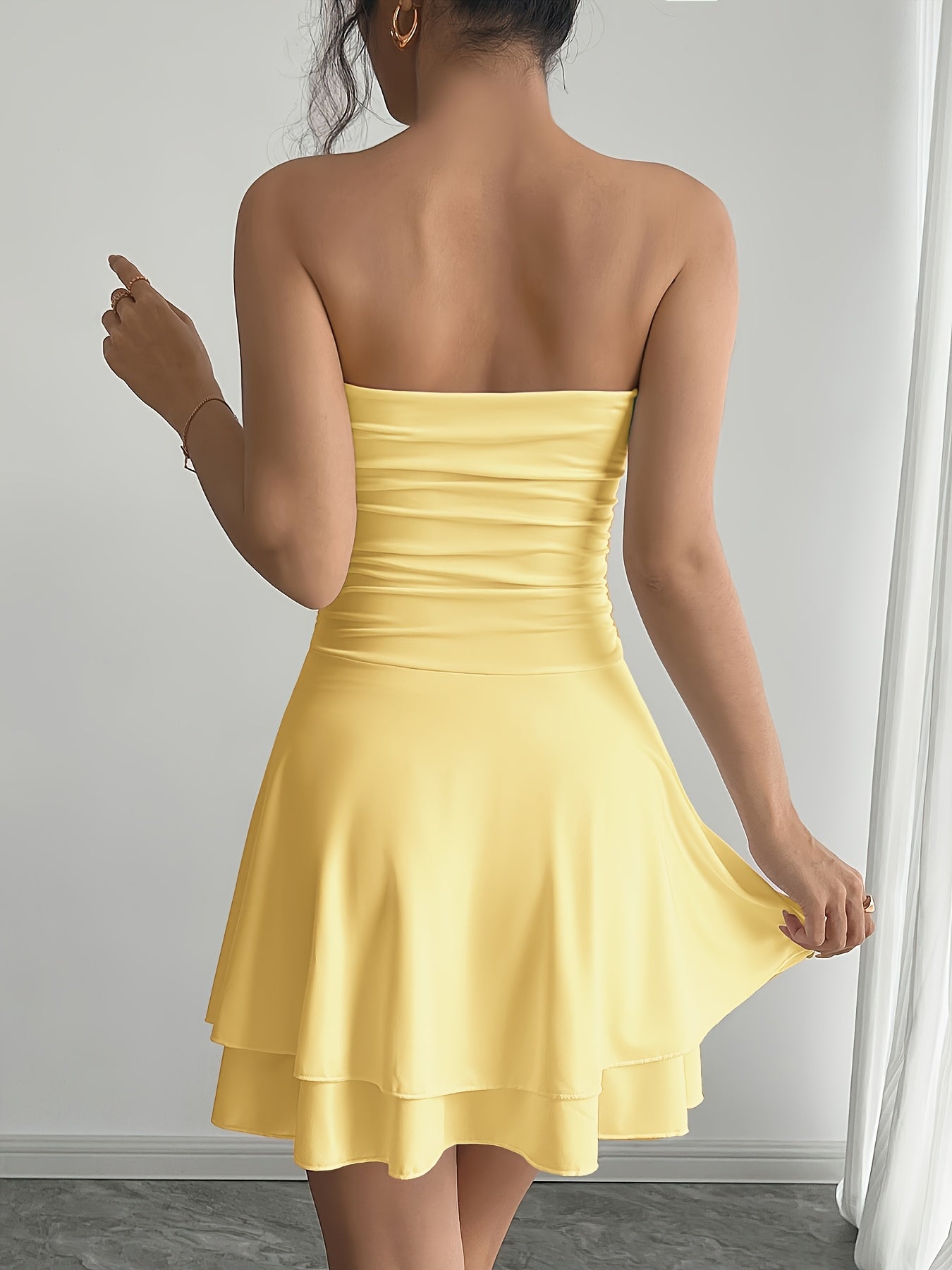 VELMORA-  Mouwloze Jurk